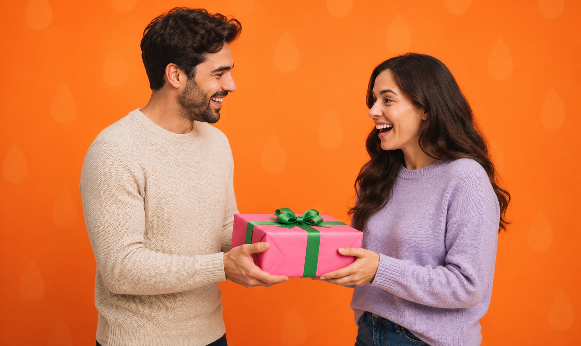 One person handing a wrapped gift to another, both laughing, against an orange background